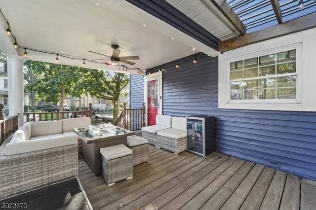 a outdoor space with patio the couches and a dining table with the view of kitchen