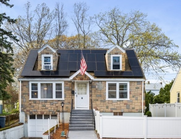 15 Oak Road Medford, MA 02155 - Photo 1 of 18 a front view of a house with a yard