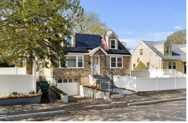 15 Oak Road Medford, MA 02155 - Photo 2 of 18 a front view of a house with a yard