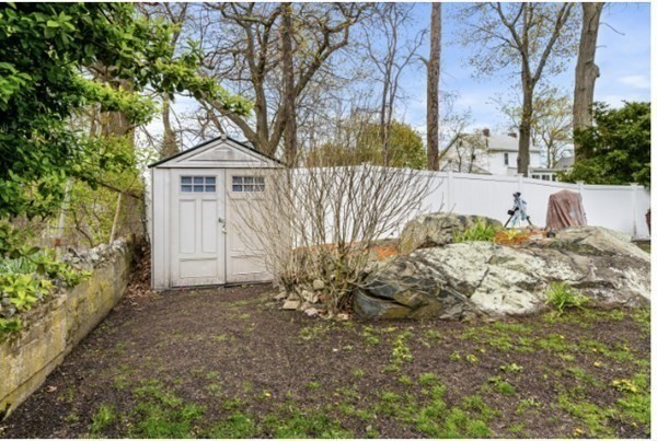 15 Oak Road Medford, MA 02155 - Photo 4 of 18 a view of a house with a yard