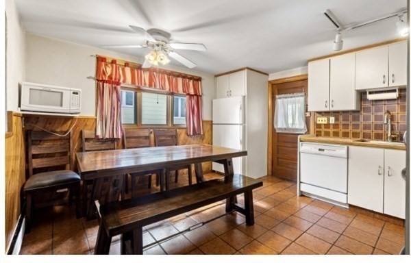 15 Oak Road Medford, MA 02155 - Photo 8 of 18 a view of a dining room with furniture window and wooden floor