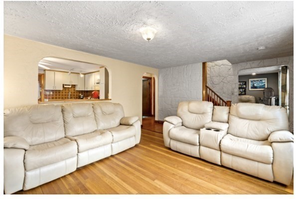 15 Oak Road Medford, MA 02155 - Photo 9 of 18 a living room with furniture and a couch