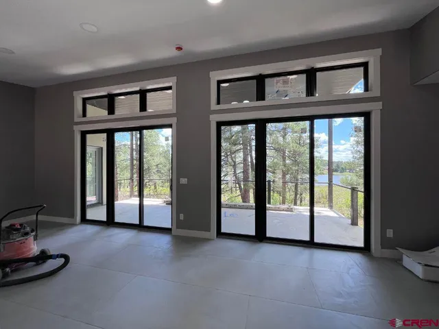 an empty room with windows