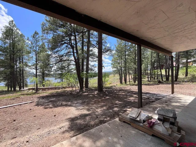 a black and white photo of a swimming pool