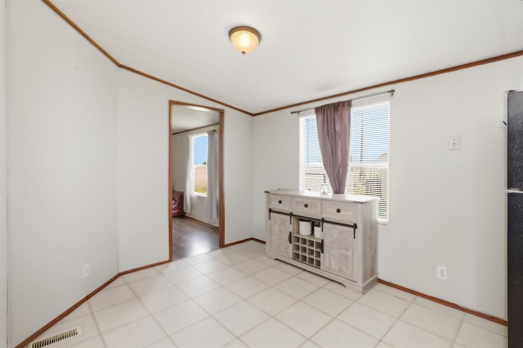 2538 County Road 2320 Decatur, TX 76234 - Photo 14 of 40 a view of an empty room with window and hardwood floor
