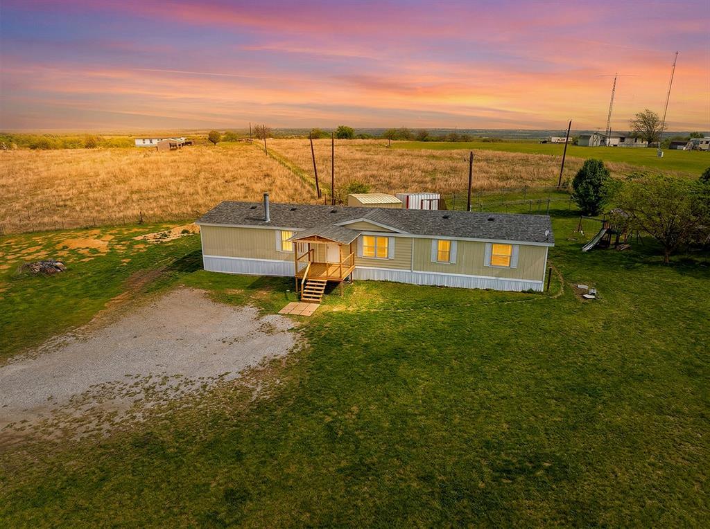 2538 County Road 2320 Decatur, TX 76234 - Photo 2 of 40 a view of a ocean with a nearby beach
