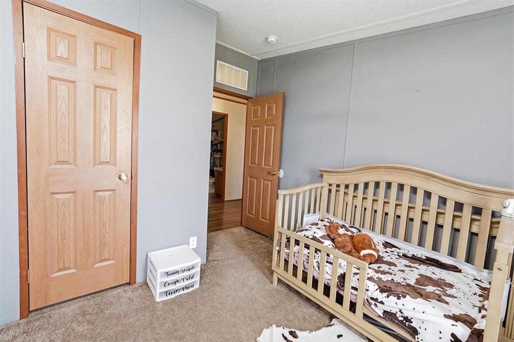 2538 County Road 2320 Decatur, TX 76234 - Photo 26 of 40 a view of a bedroom with wooden floor