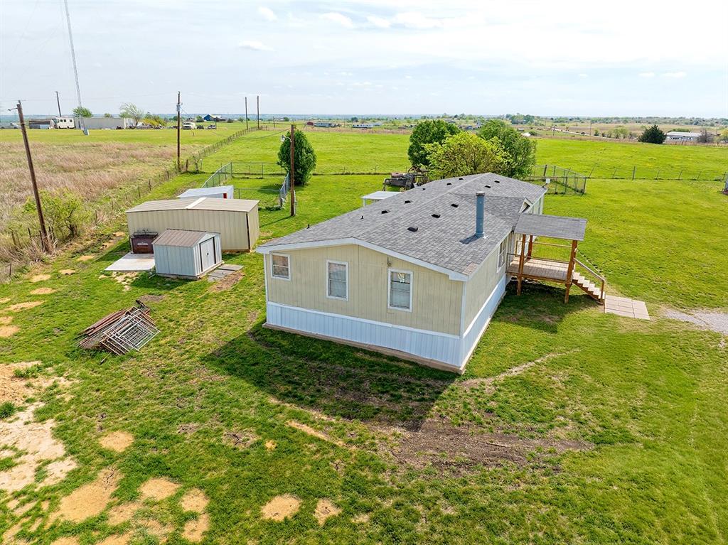 2538 County Road 2320 Decatur, TX 76234 - Photo 33 of 40 an aerial view of a house with a garden and lake view