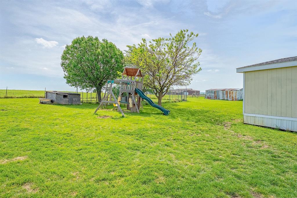 2538 County Road 2320 Decatur, TX 76234 - Photo 36 of 40 a view of yard with swimming pool and green space