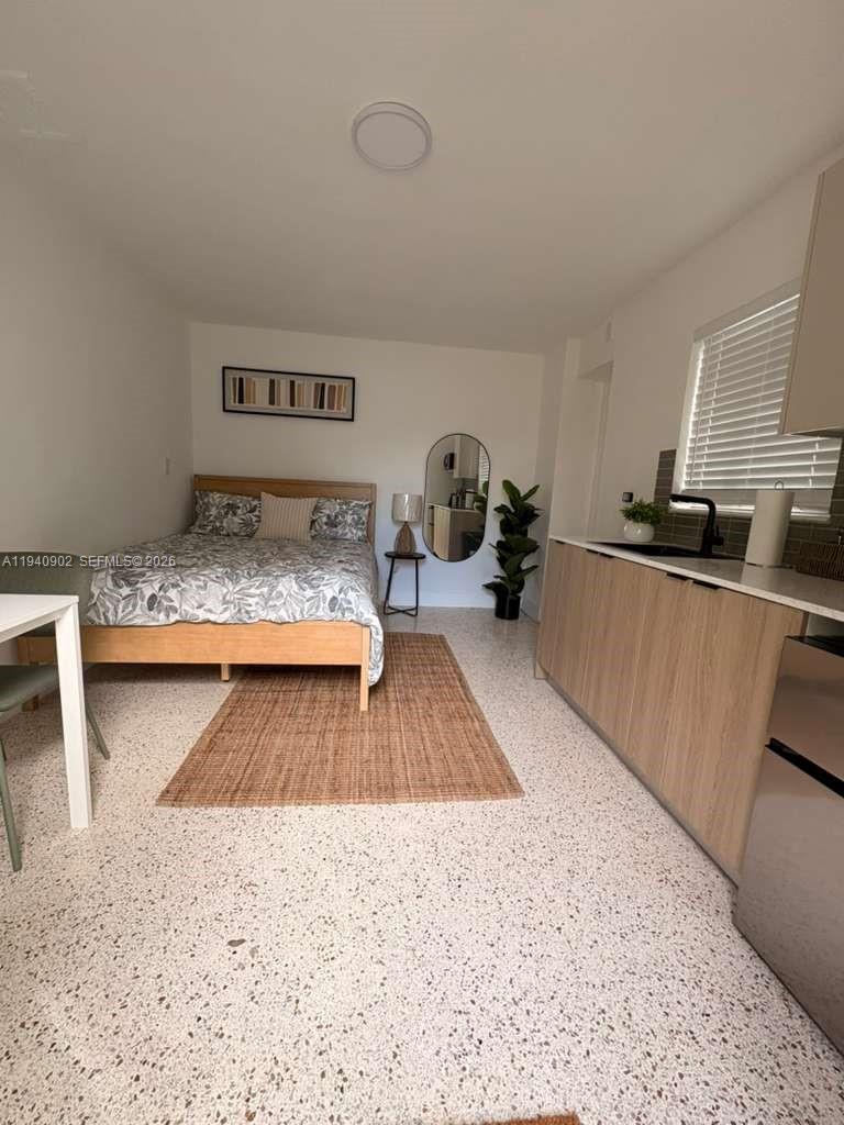 2442 Southwest 3rd Street, Unit 4 Miami, FL 33135 - Photo 5 of 13 a very nice looking kitchen with a large window