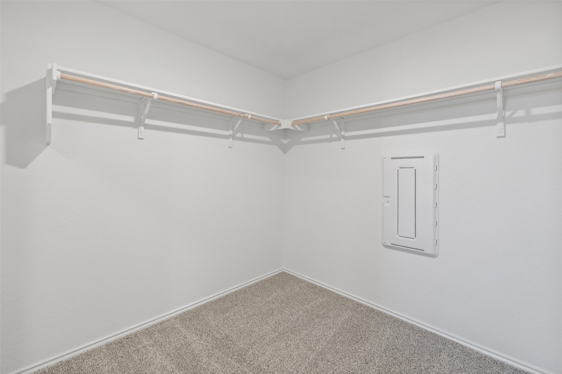 173 Balmorhea Street Kyle, TX 78640 - Photo 20 of 29 a view of an empty walk in closet