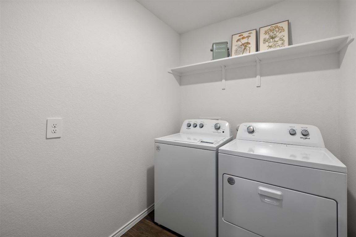 173 Balmorhea Street Kyle, TX 78640 - Photo 29 of 29 a utility room with dryer and washer