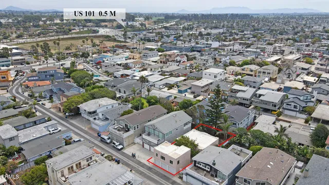 an aerial view of a city with lots of residential buildings
