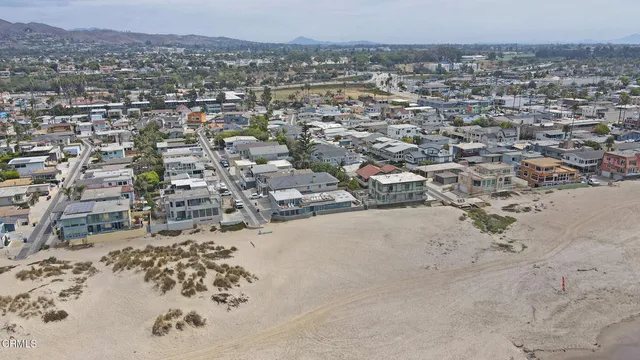 an aerial view of a house with a outdoor space