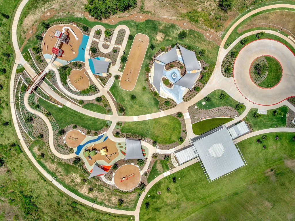 8417 Laughlin Lane Austin, TX 78744 - Photo 32 of 38 an aerial view of a house with garden space and swimming pool