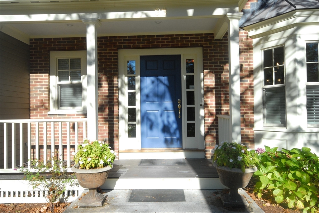 96 Forest Ridge Road, Unit 96 Concord, MA 01742 - Photo 2 of 36 a front view of a house