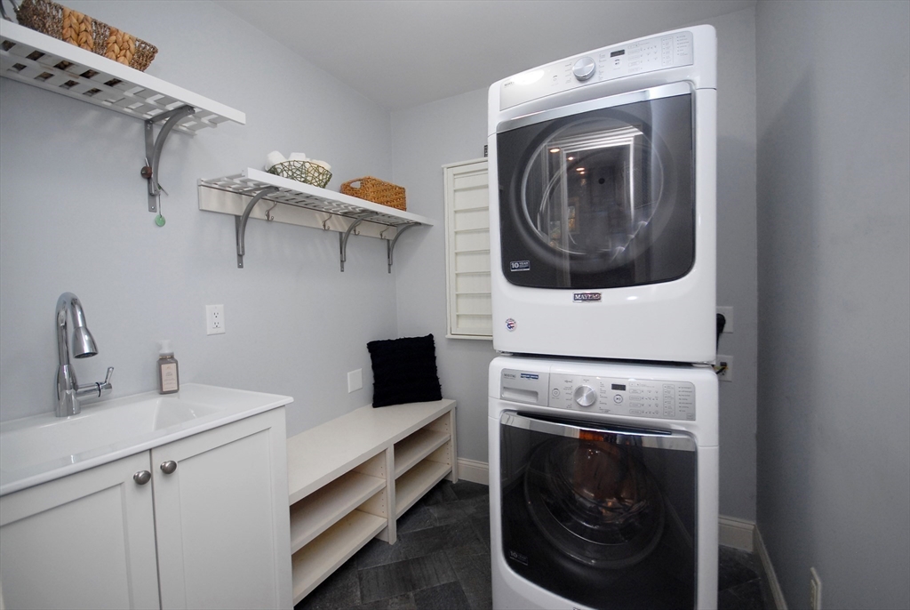96 Forest Ridge Road, Unit 96 Concord, MA 01742 - Photo 21 of 36 a utility room with dryer and washer