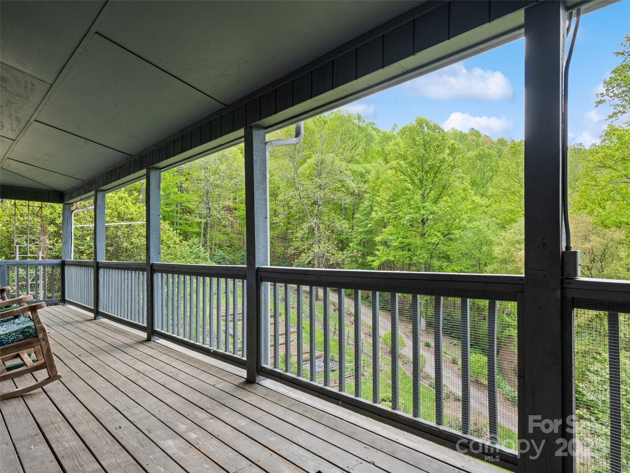 195 Three Springs Drive Sylva, NC 28779 - Photo 18 of 48 a view of balcony with wooden floor