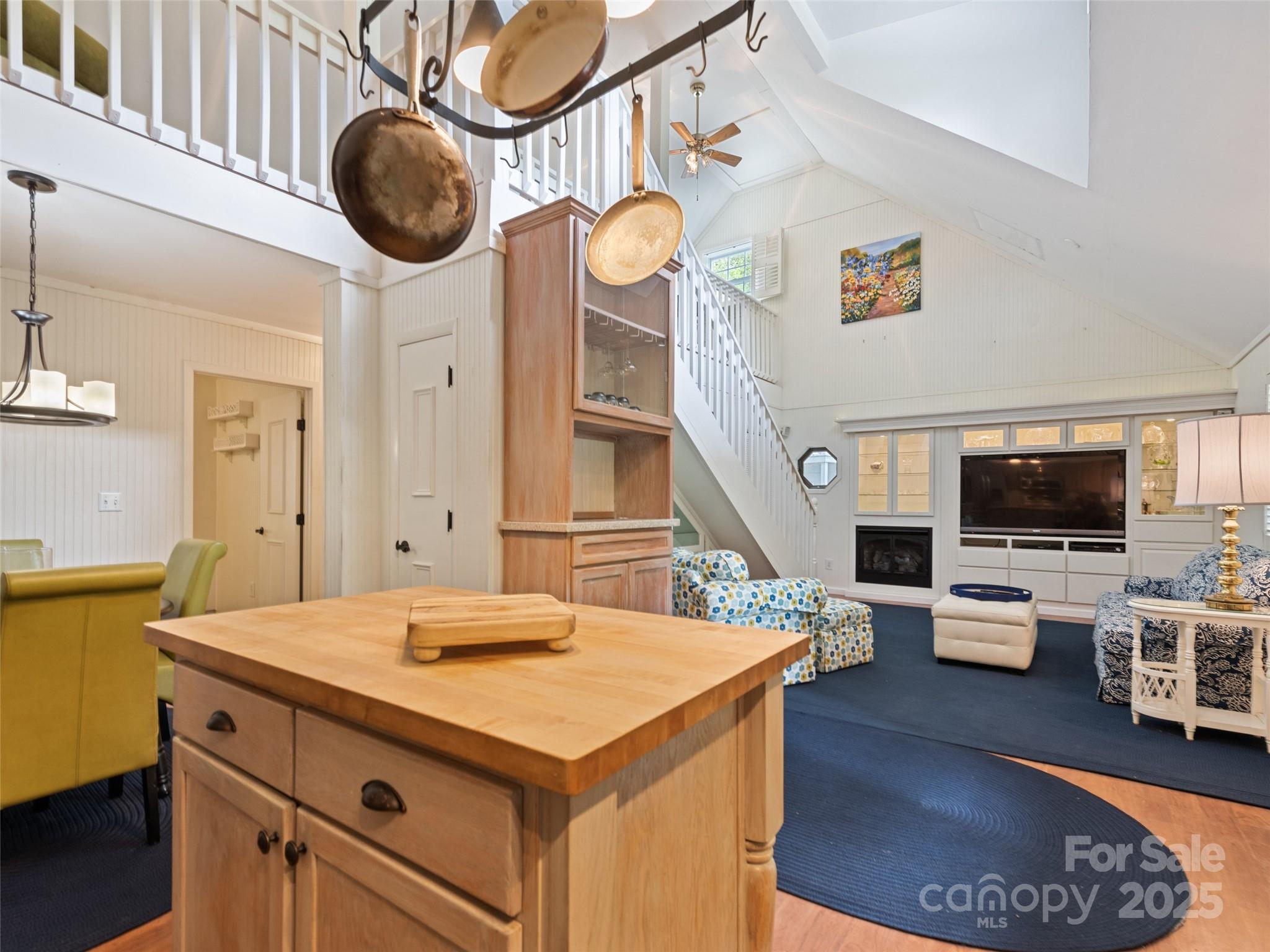 195 Three Springs Drive Sylva, NC 28779 - Photo 25 of 48 a living room with furniture and a flat screen tv