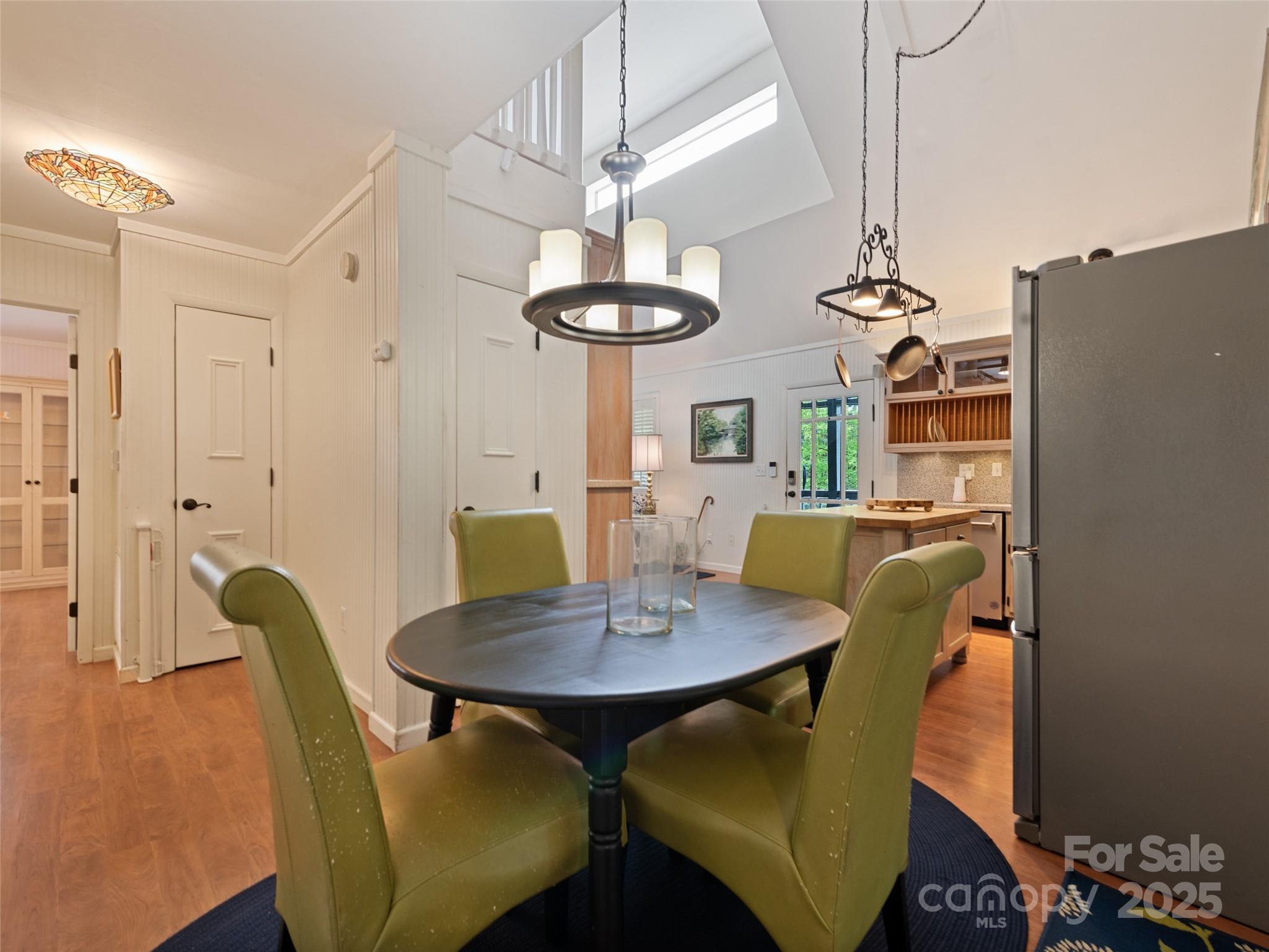 195 Three Springs Drive Sylva, NC 28779 - Photo 28 of 48 a view of a dining room with furniture and window