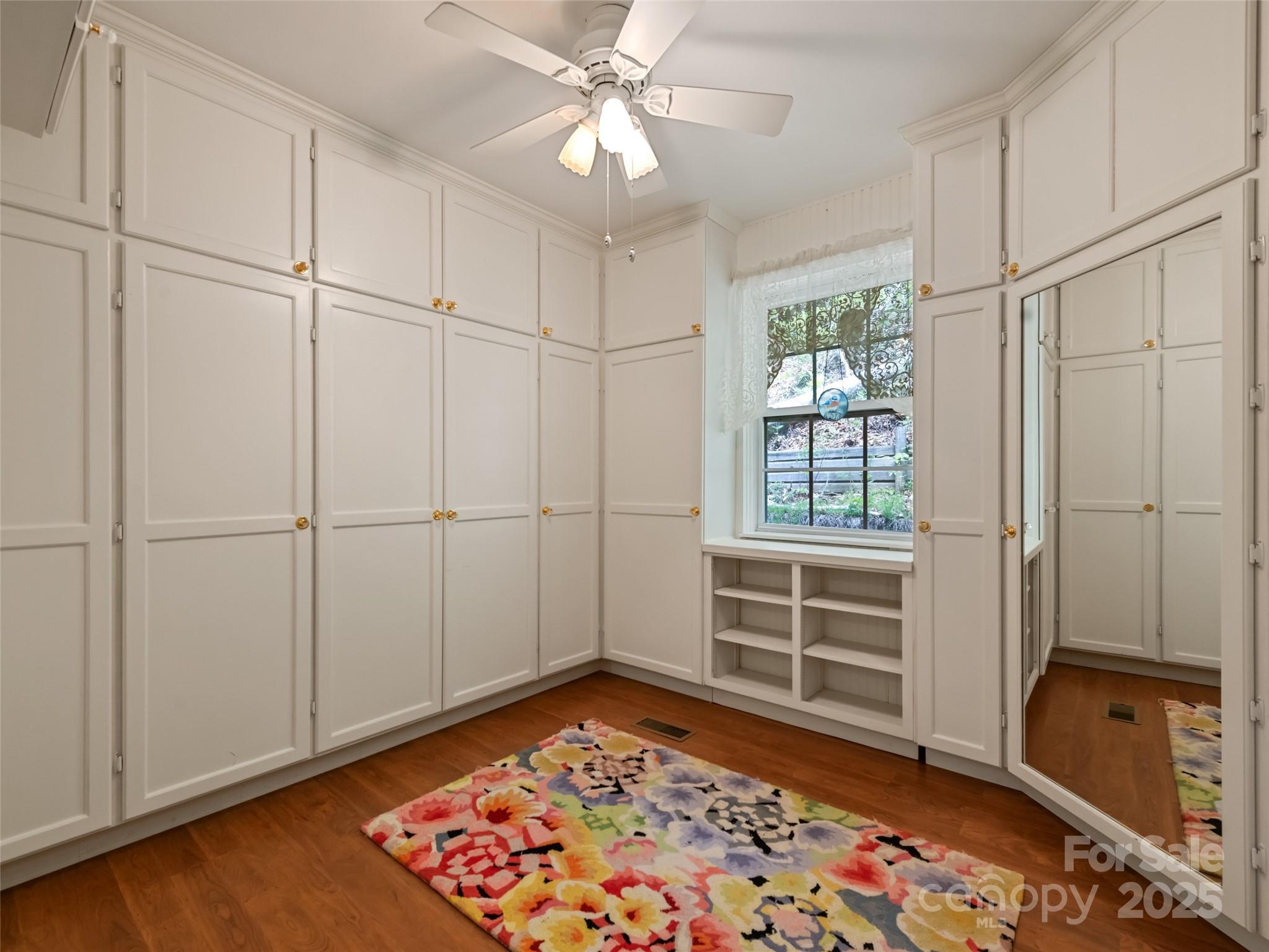 195 Three Springs Drive Sylva, NC 28779 - Photo 33 of 48 a view of room with window and hardwood floor