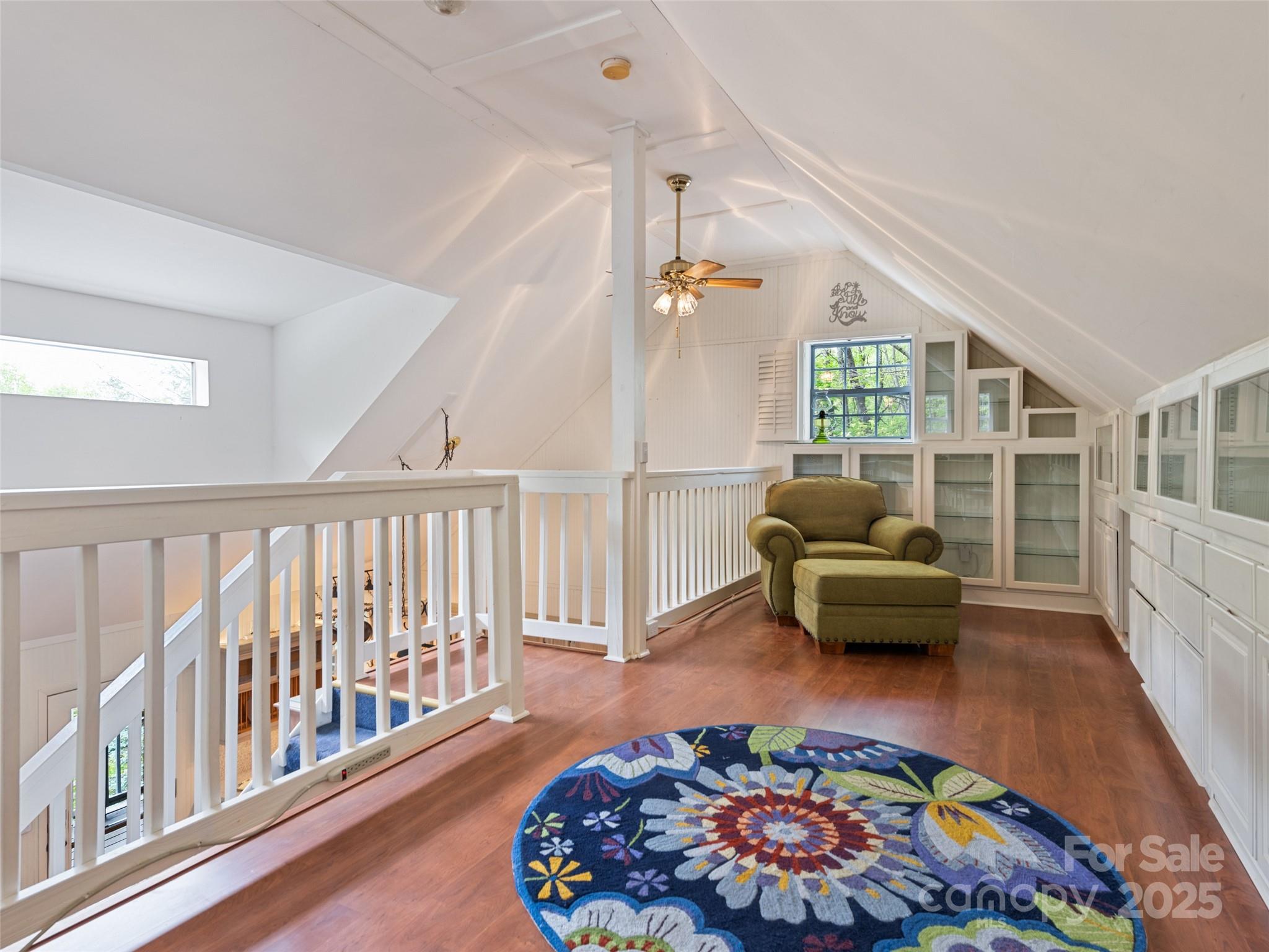 195 Three Springs Drive Sylva, NC 28779 - Photo 40 of 48 a living room with furniture and a rug