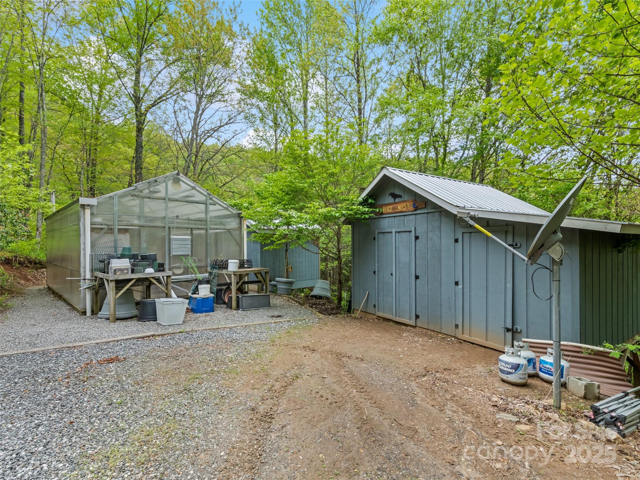 195 Three Springs Drive Sylva, NC 28779 - Photo 46 of 48 a view of a house with large outdoor space and wooden fence