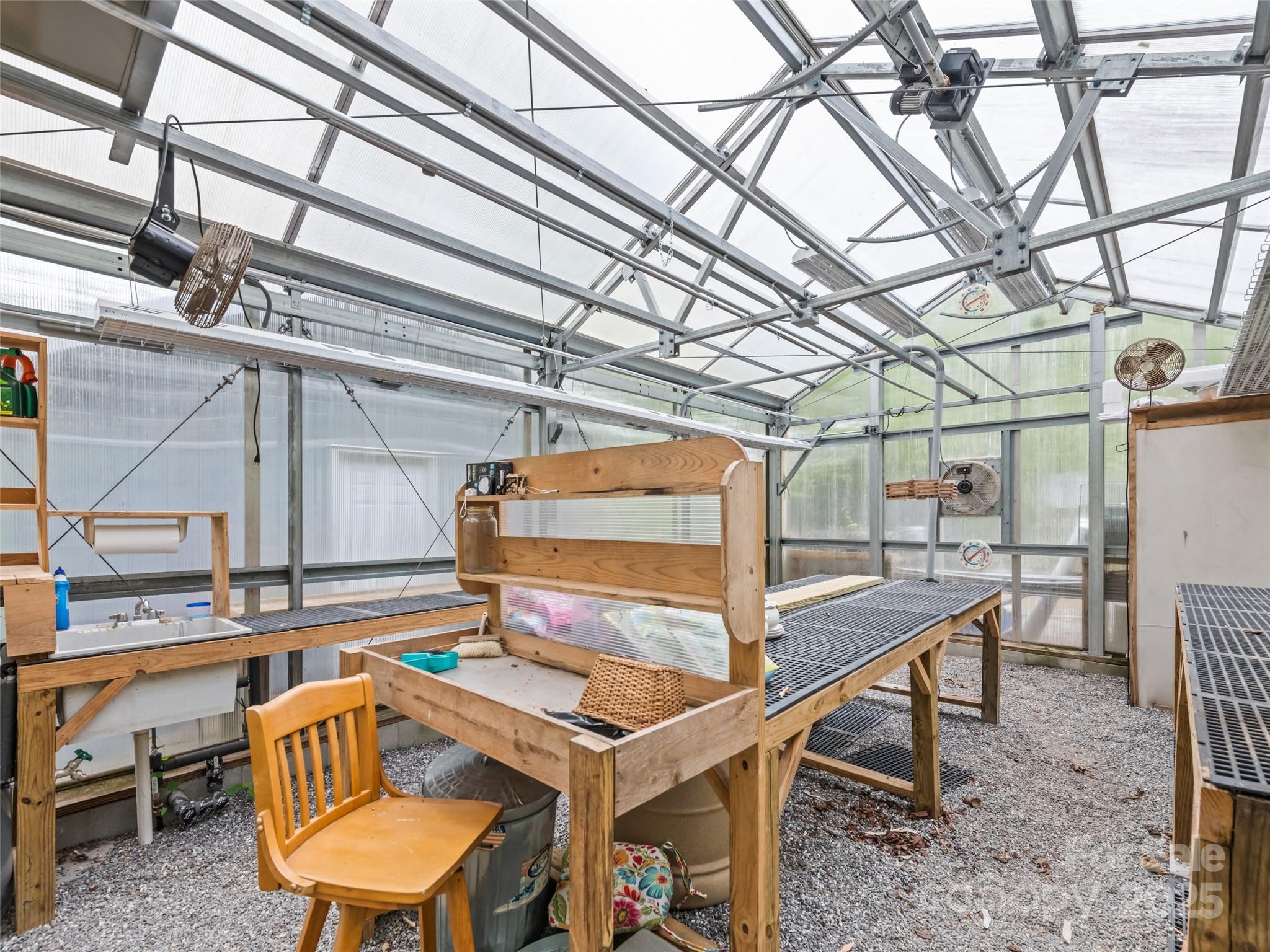 195 Three Springs Drive Sylva, NC 28779 - Photo 47 of 48 a view of a kitchen with a table and chairs