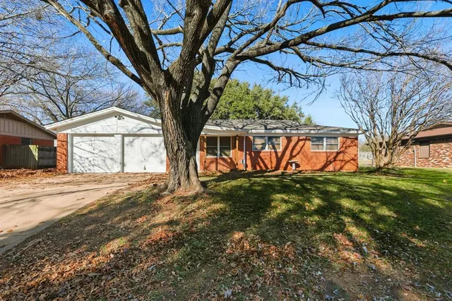 a view of backyard of house