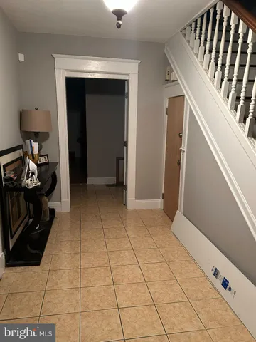 a view of an entryway with a rug