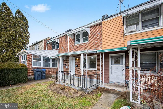 a front view of a house with a porch