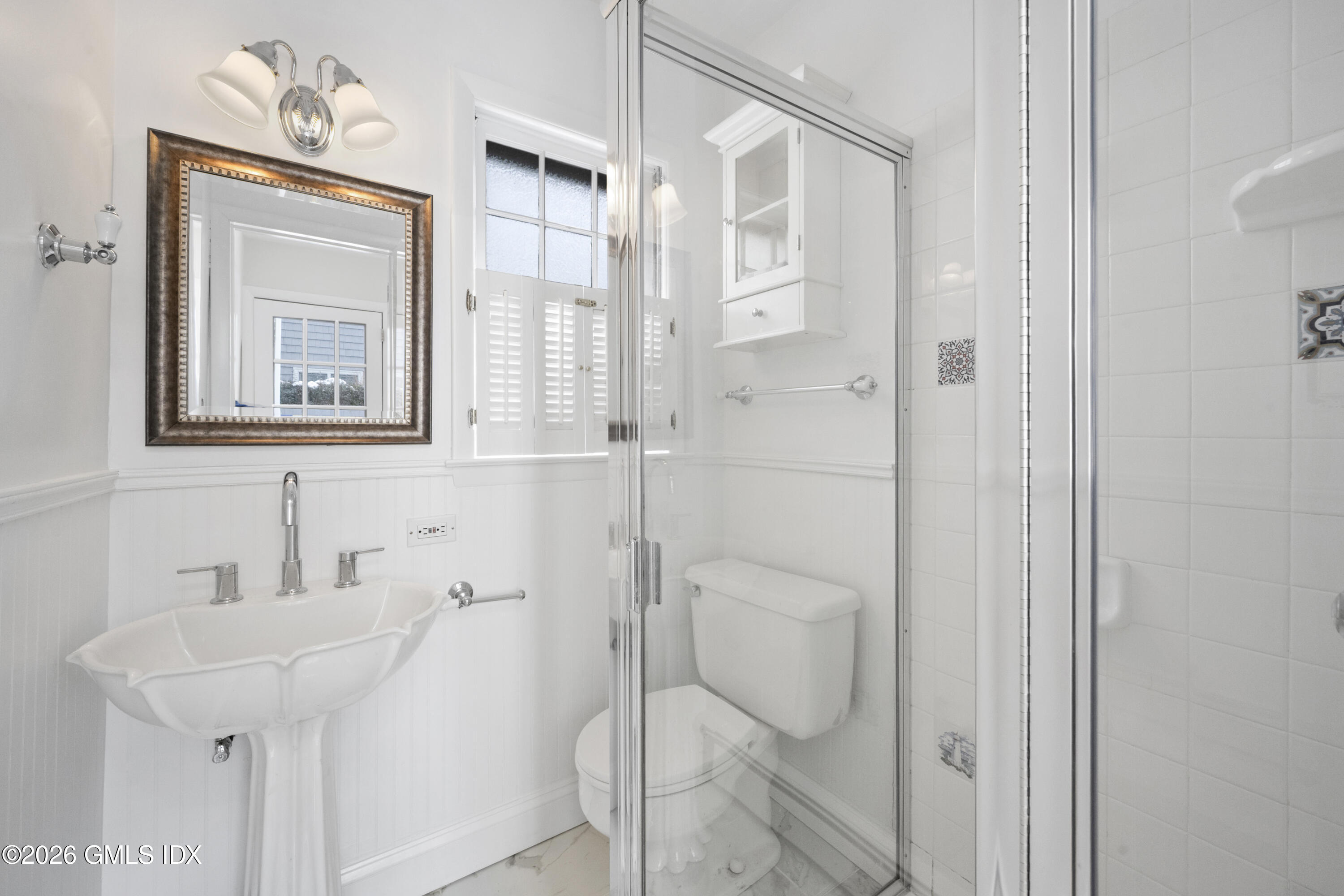 10 Anthony Place Riverside, CT 06878 - Photo 11 of 24 a bathroom with a shower and sink