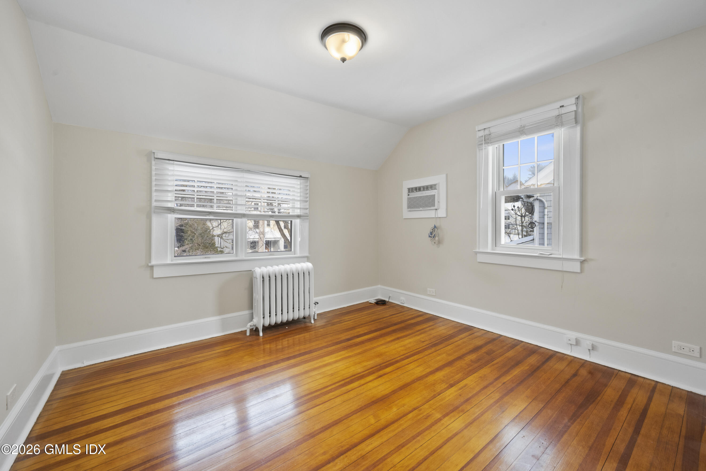 10 Anthony Place Riverside, CT 06878 - Photo 12 of 24 a view of a room with wooden floor and window