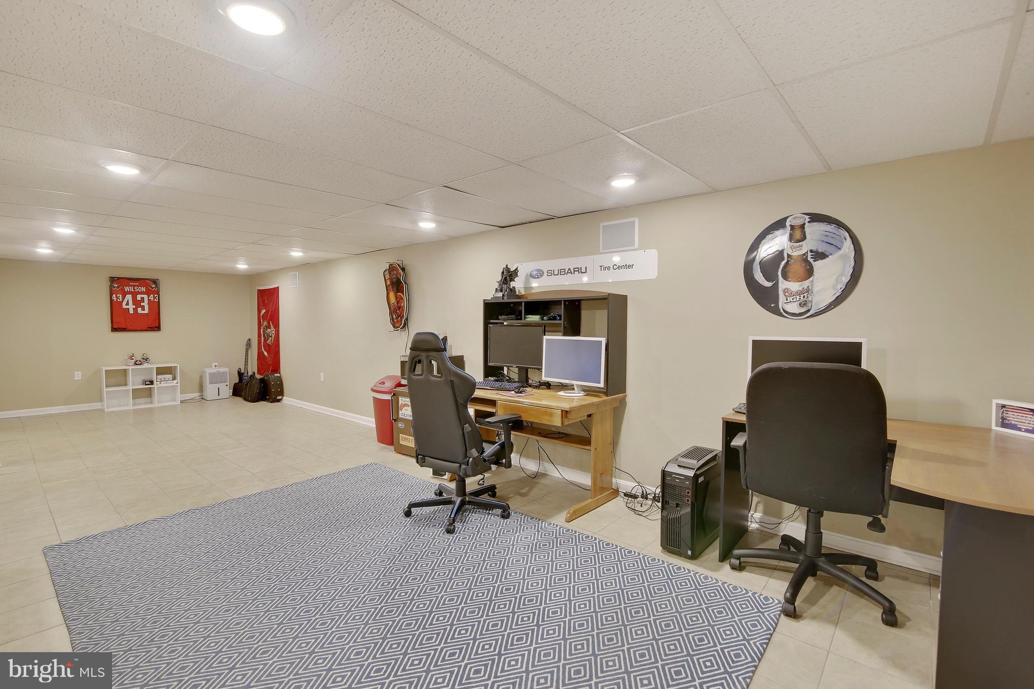 6720 Ford Road Frederick, MD 21702 - Photo 14 of 24 Expansive finished lower level recreation area