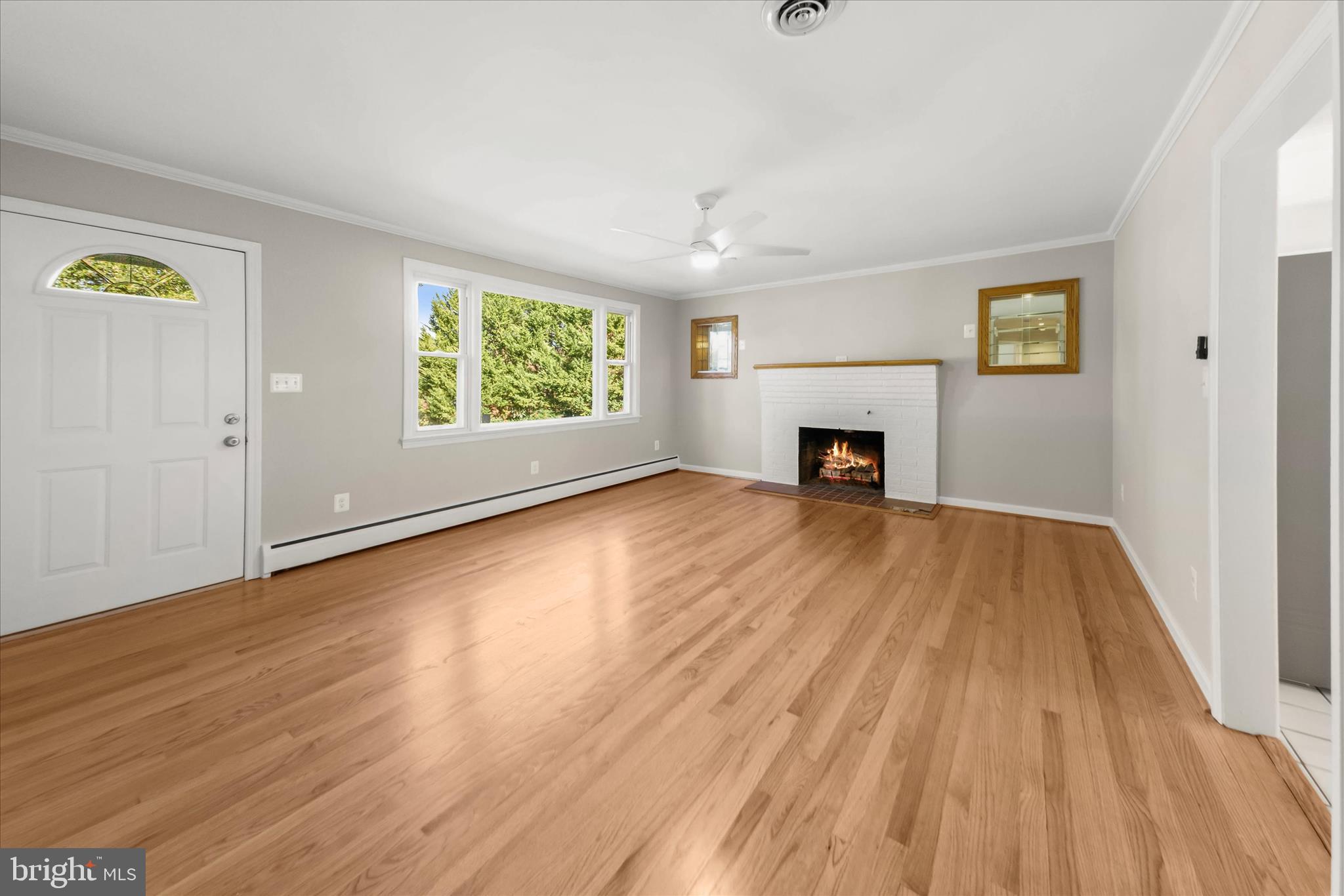 12775 Frederick Road West Friendship, MD 21794 - Photo 14 of 65 wooden floor in an empty room with a window