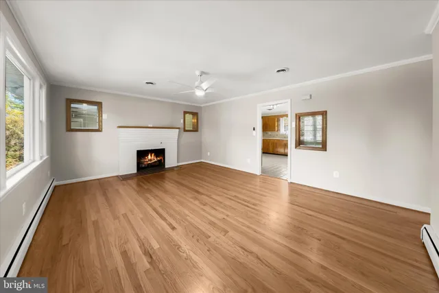 a kitchen with stainless steel appliances a stove a sink and a refrigerator