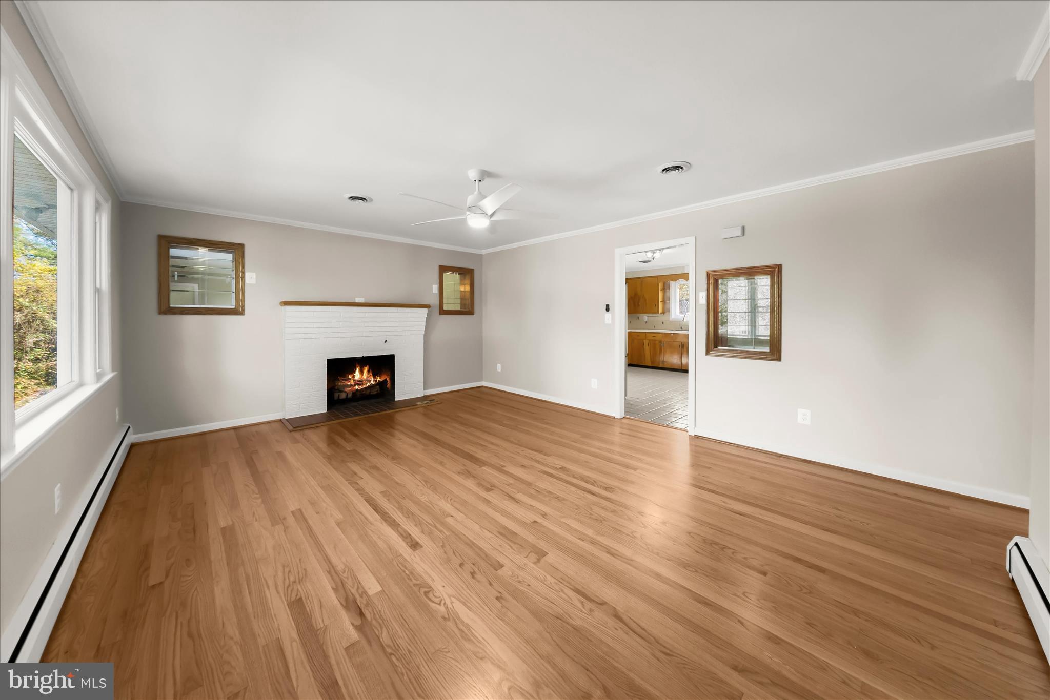 12775 Frederick Road West Friendship, MD 21794 - Photo 15 of 65 wooden floor in an empty room with a window