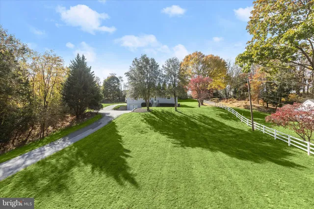 a view of a house with a big yard