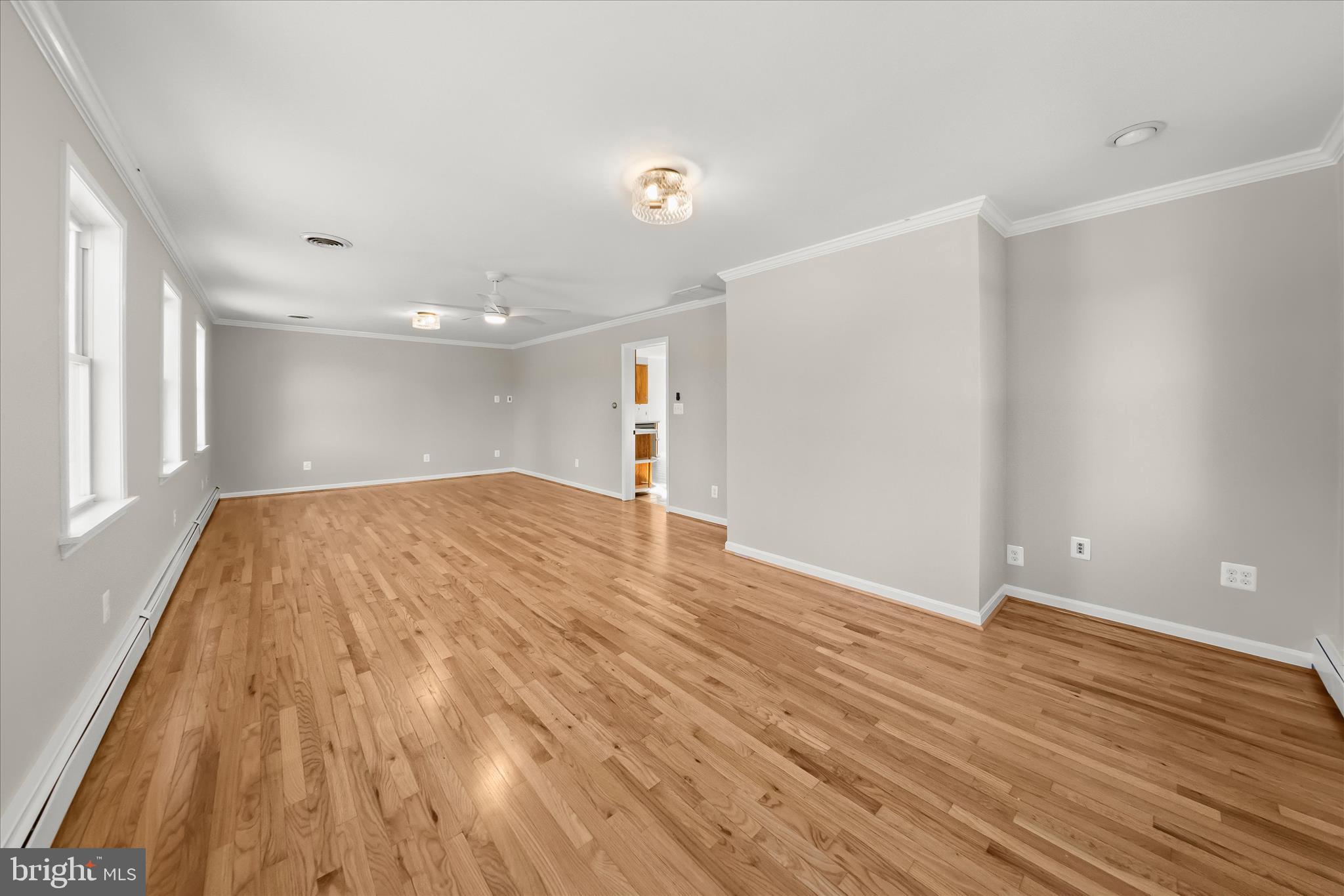 12775 Frederick Road West Friendship, MD 21794 - Photo 22 of 65 a view of empty room with wooden floor