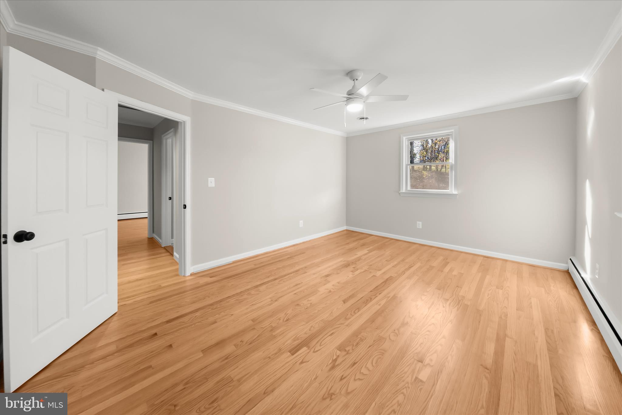 12775 Frederick Road West Friendship, MD 21794 - Photo 26 of 65 wooden floor in an empty room with a window