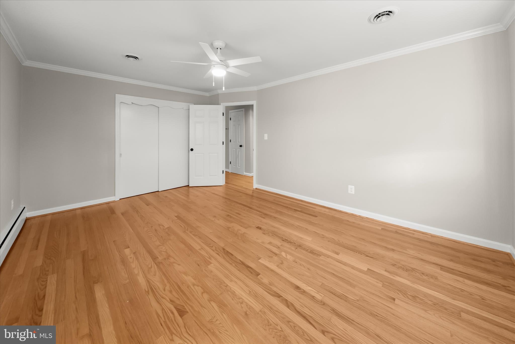 12775 Frederick Road West Friendship, MD 21794 - Photo 27 of 65 a view of empty room with wooden floor