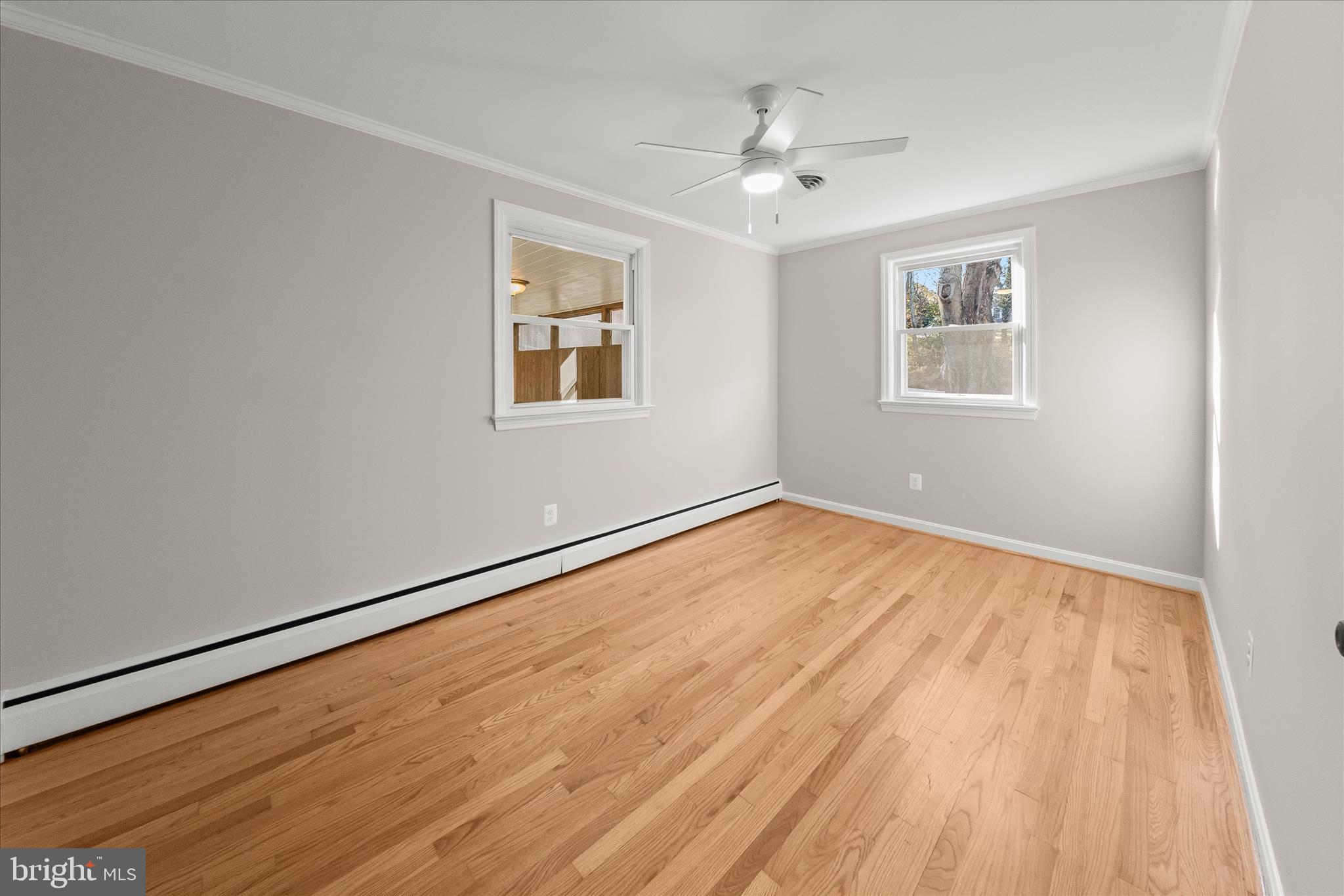 12775 Frederick Road West Friendship, MD 21794 - Photo 29 of 65 a view of empty room with wooden floor