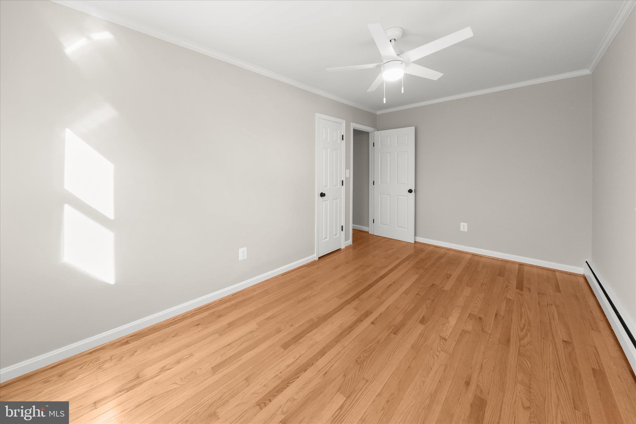 12775 Frederick Road West Friendship, MD 21794 - Photo 30 of 65 wooden floor in an empty room with a window