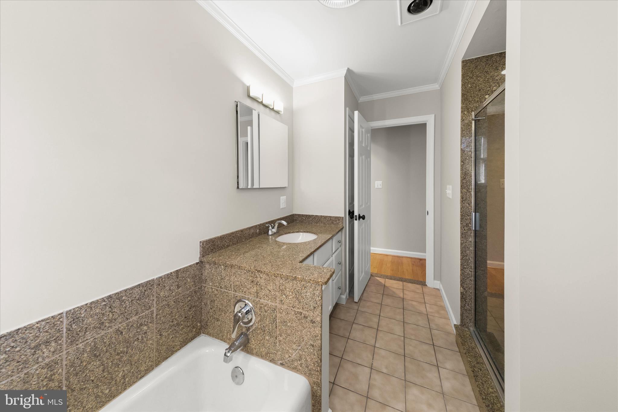 12775 Frederick Road West Friendship, MD 21794 - Photo 32 of 65 a bathroom with a sink and mirror