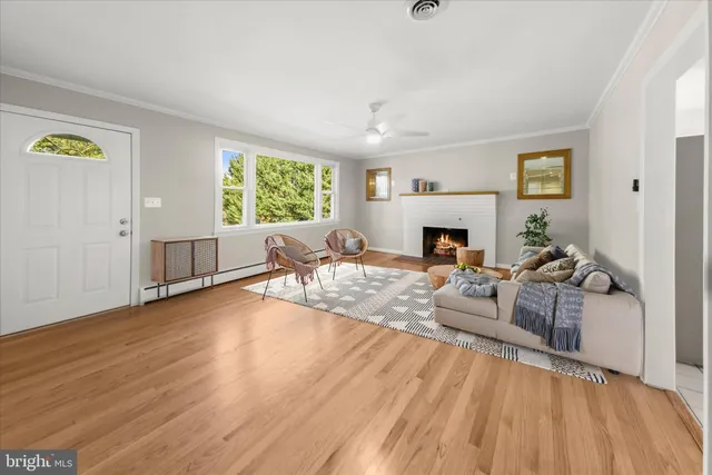 a large kitchen with stainless steel appliances granite countertop a stove sink and cabinets