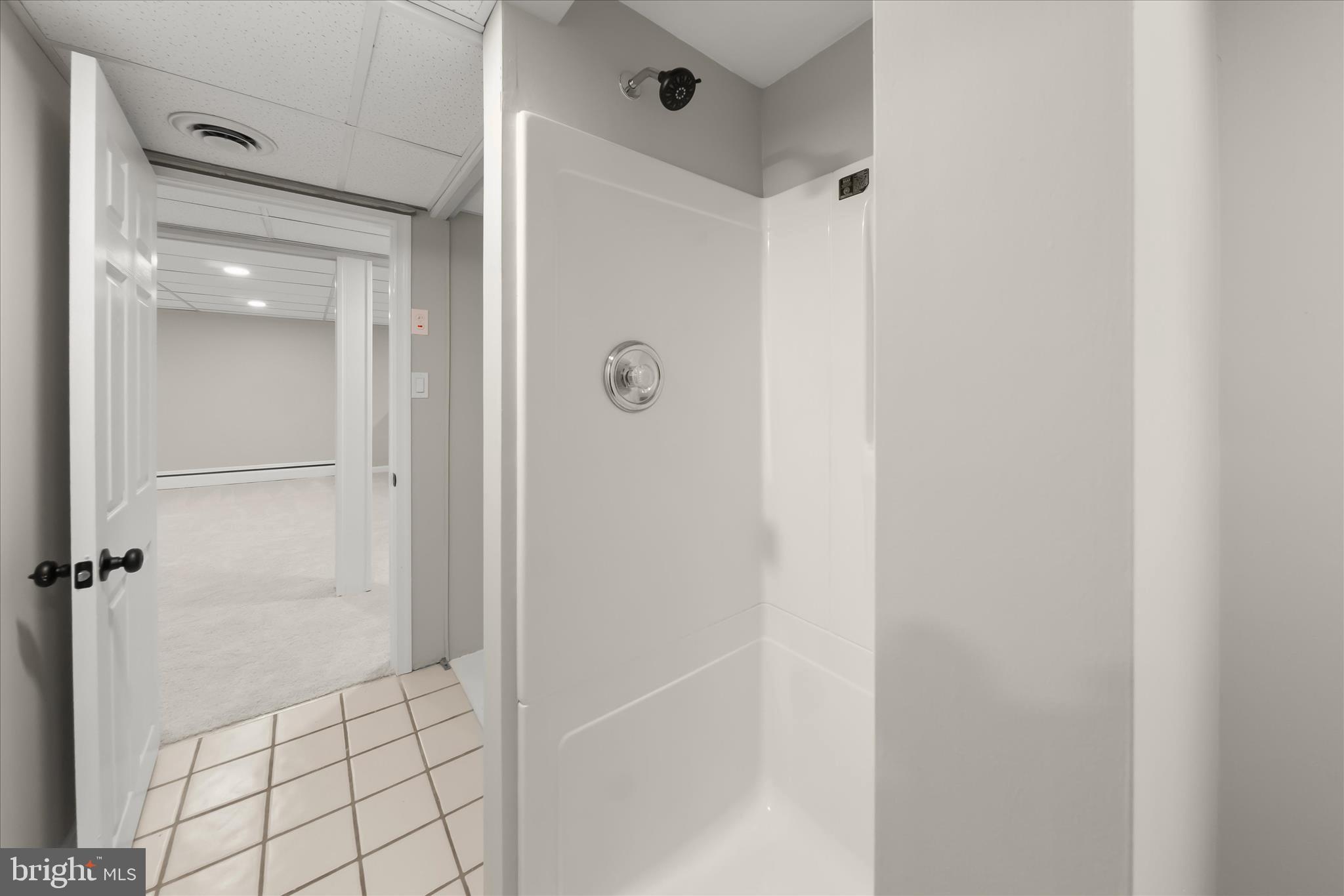 12775 Frederick Road West Friendship, MD 21794 - Photo 42 of 65 a bathroom with a shower