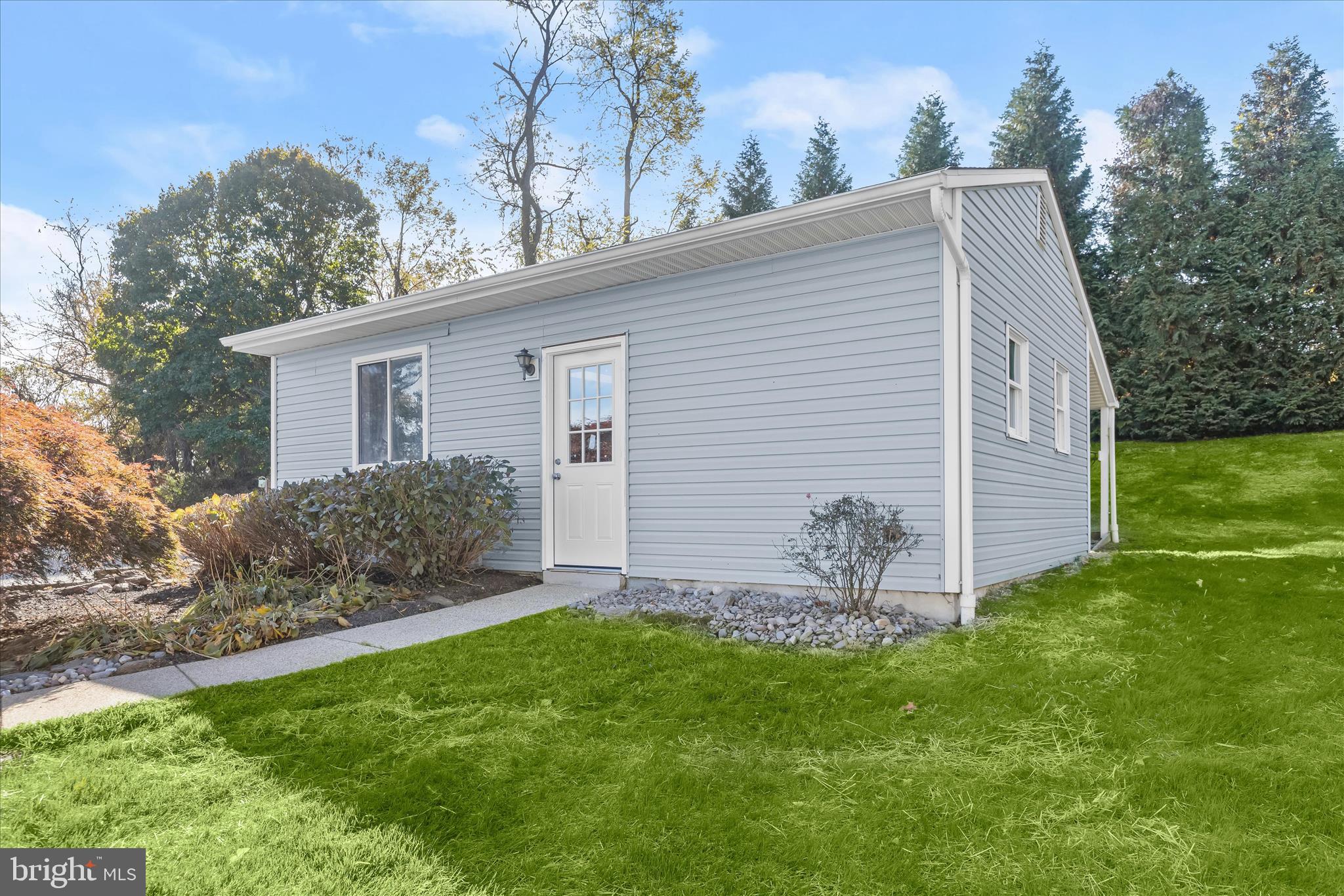 12775 Frederick Road West Friendship, MD 21794 - Photo 52 of 65 a backyard of a house with table and chairs