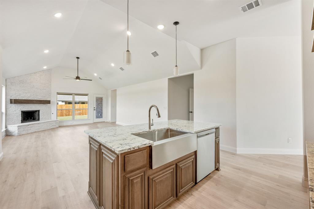 2016 Hickory Chase Lane Anna, TX 75409 - Photo 11 of 35 a kitchen with a sink and chandelier
