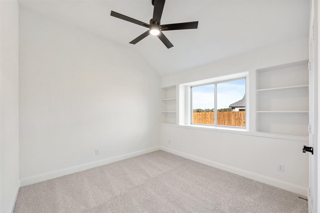 2016 Hickory Chase Lane Anna, TX 75409 - Photo 26 of 35 an empty room with a window and a fan