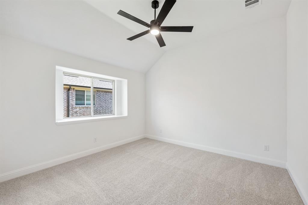2016 Hickory Chase Lane Anna, TX 75409 - Photo 29 of 35 an empty room with a window and a fan
